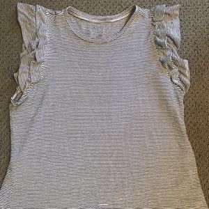 a new day blk and why stripe sleeveless ruffle top